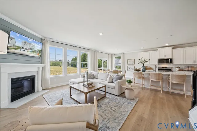 a bathroom with a glass shower door and a sink
