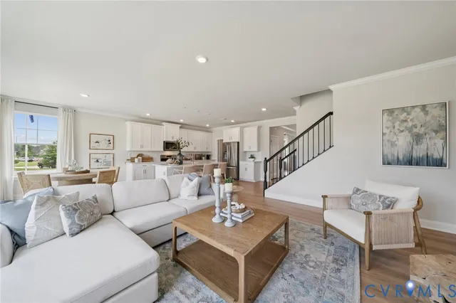 a living room with furniture and a table