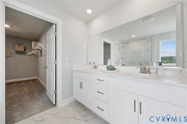 a living room with furniture large window and a fireplace