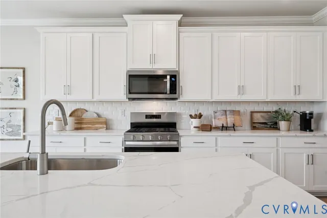 a dining room with furniture wooden floor and a rug