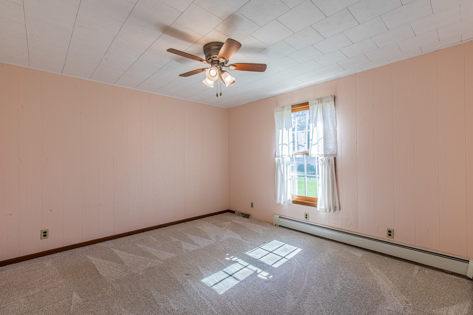 1 Century Road Spring Valley, IL 61362 - Photo 13 of 24 an empty room with windows and fan