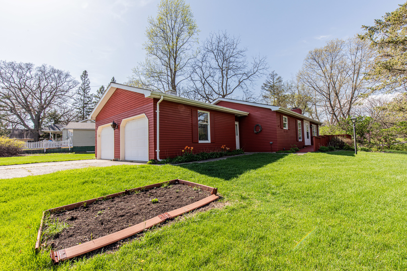 1 Century Road Spring Valley, IL 61362 - Photo 3 of 24 a view of a yard with brick house and a large tree