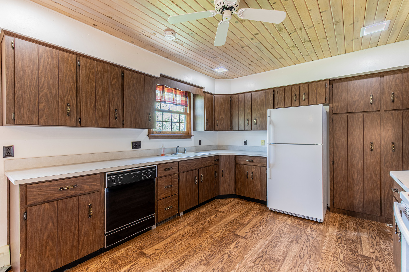 1 Century Road Spring Valley, IL 61362 - Photo 10 of 24 a kitchen with a sink a refrigerator and window
