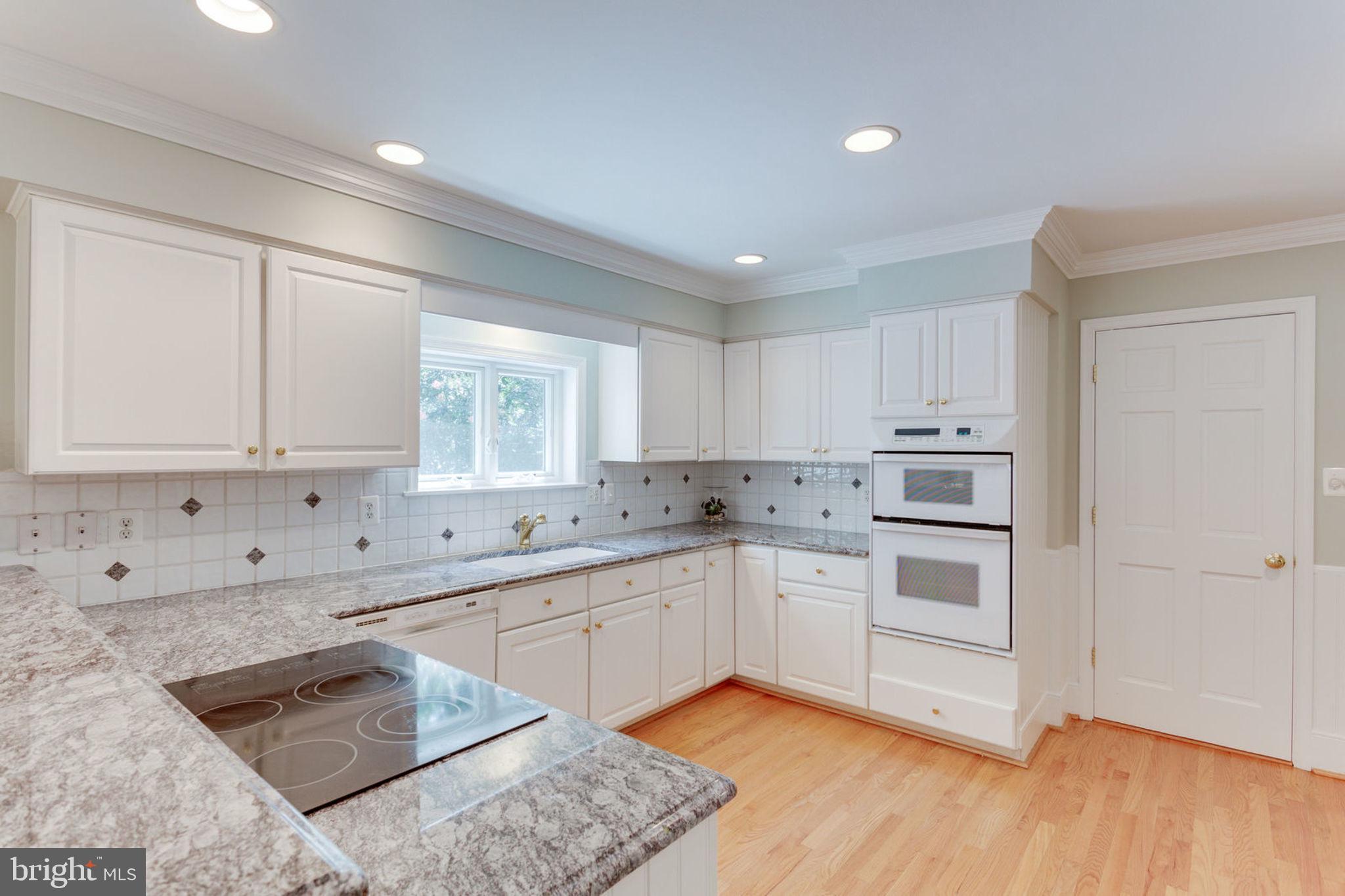 533 Clear Spring Road Great Falls, VA 22066 - Photo 16 of 63 Renovated Kitchen with Granite Counters
