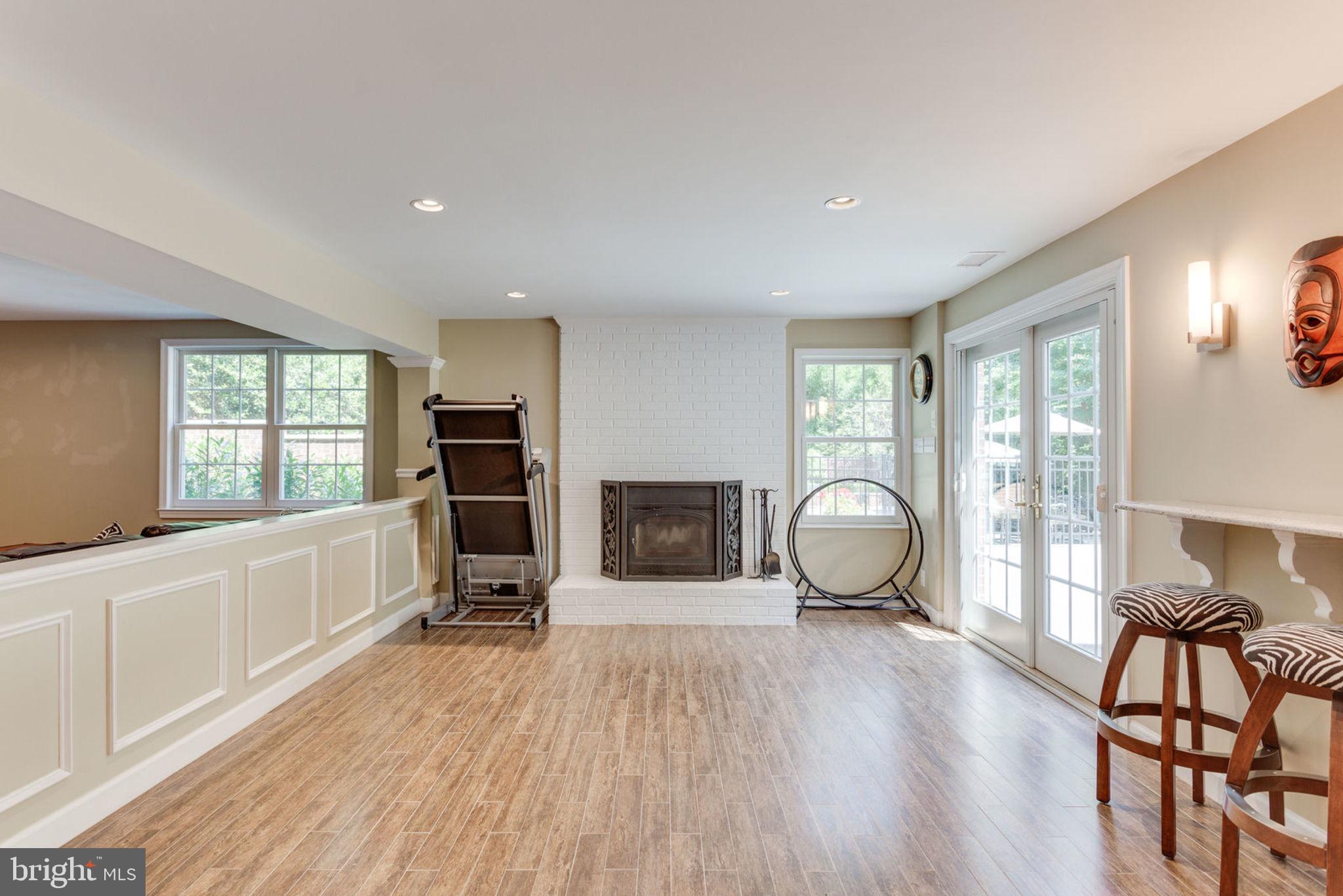 533 Clear Spring Road Great Falls, VA 22066 - Photo 38 of 63 Wood stove puts out a lot of heat!