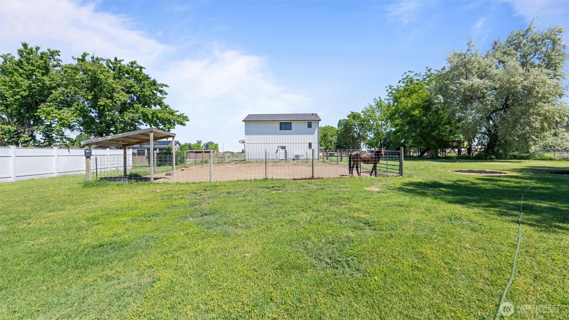457 McKinney Road Walla Walla, WA 99362 - Photo 25 of 29 a view of a house with a big yard and a large tree