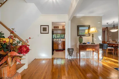 a view of a living room and dining room