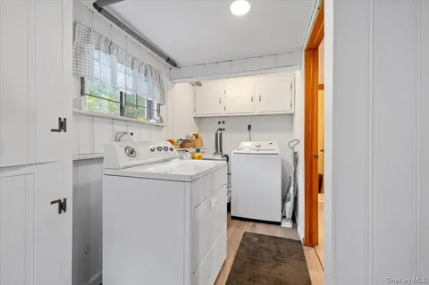 a storage room with a washer and dryer