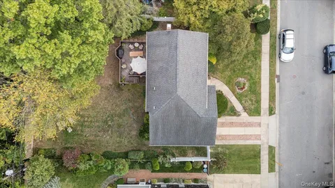 aerial view of a house with a backyard space