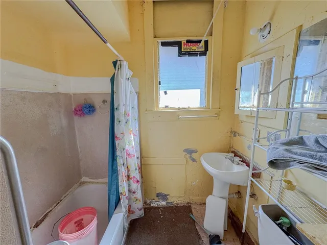 a bathroom with a sink and toilet