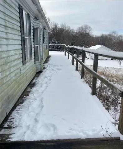 a view of a backyard of a house