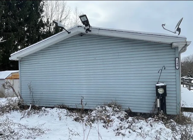 a view of a snow in the forest