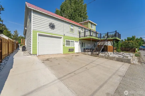 a view of house with outdoor space and porch