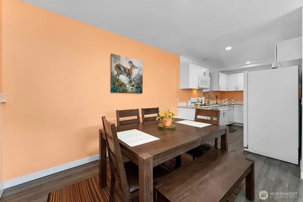 a view of a dining room with furniture
