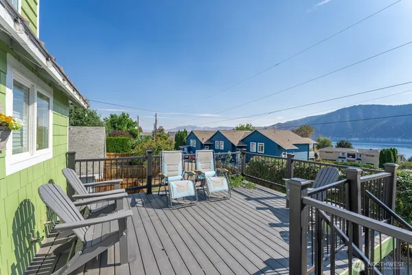 a view of a balcony with chairs