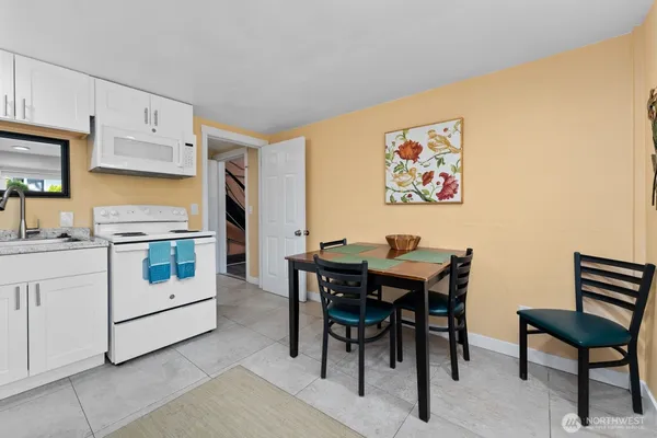 a view of a dining room with furniture