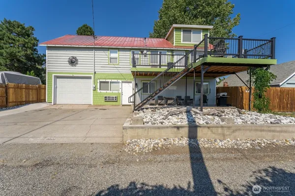 a front view of a house with a porch