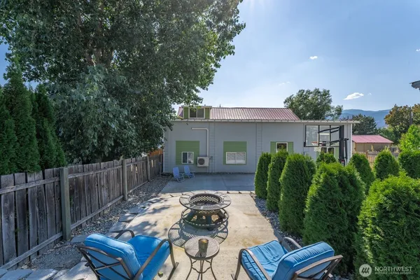 a view of a patio in backyard