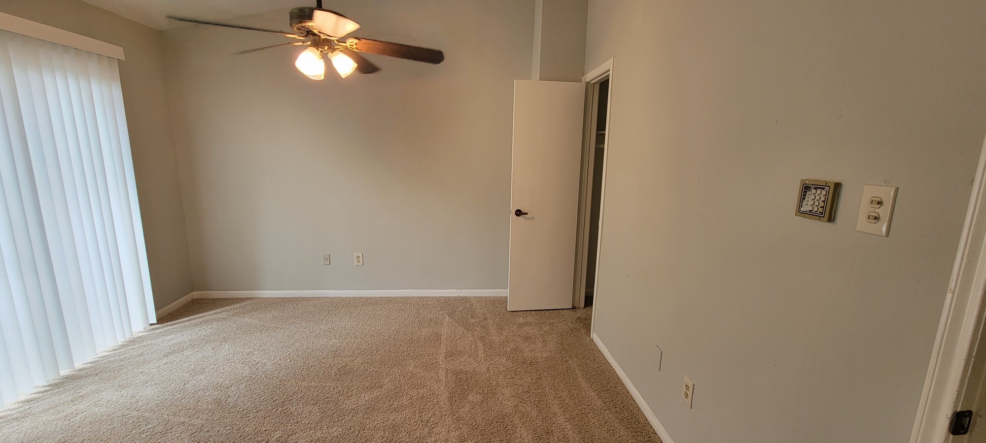7023 Alabonson Road Houston, TX 77088 - Photo 10 of 13 a view of an empty room with a window