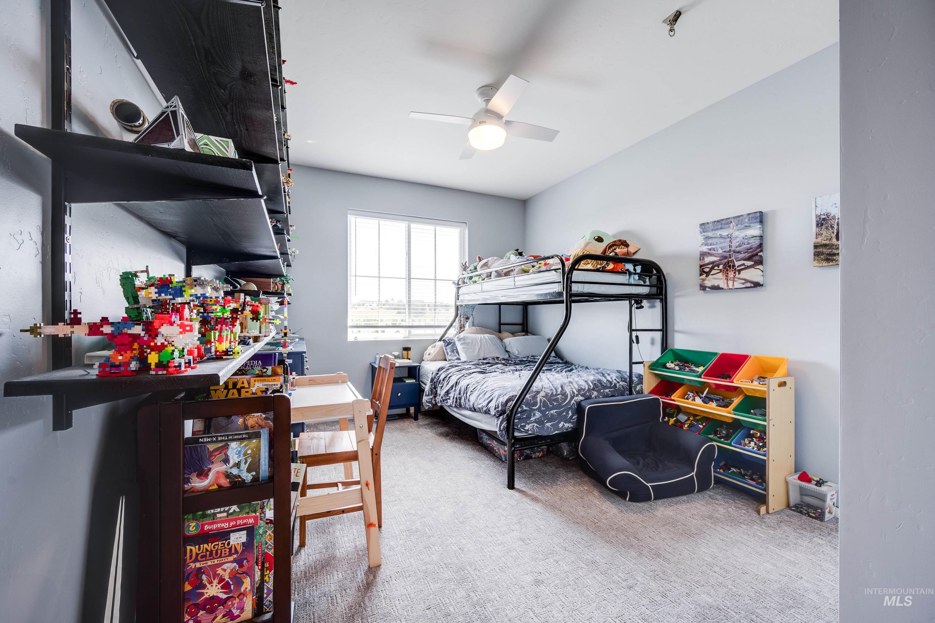 1325 Southwest Panorama Drive Pullman, WA 99163 - Photo 23 of 48 Bedroom featuring light carpet and ceiling fan
