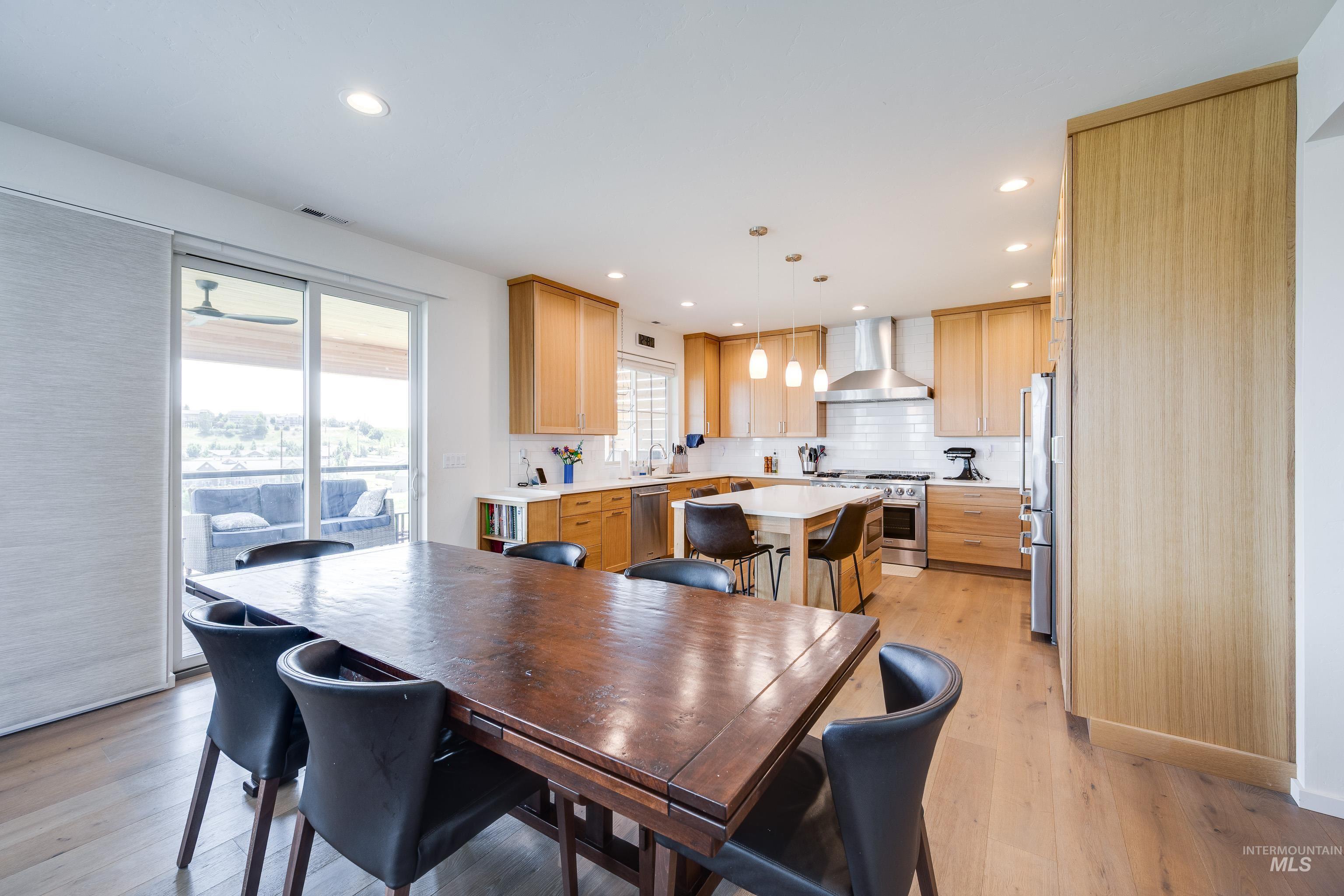 1325 Southwest Panorama Drive Pullman, WA 99163 - Photo 10 of 48 Dining room featuring light wood finished floors and recessed lighting
