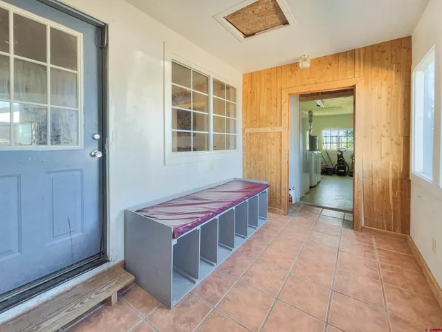 a bathroom with a tub and shower