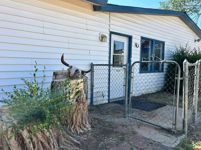 a view of a porch with furniture