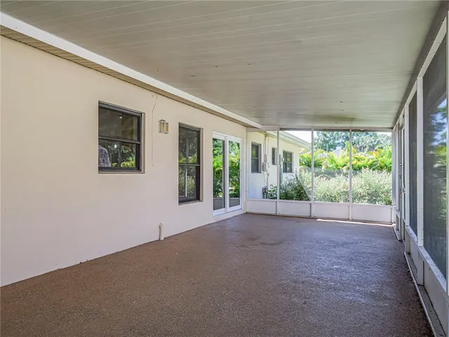 a view of a big room with a large window