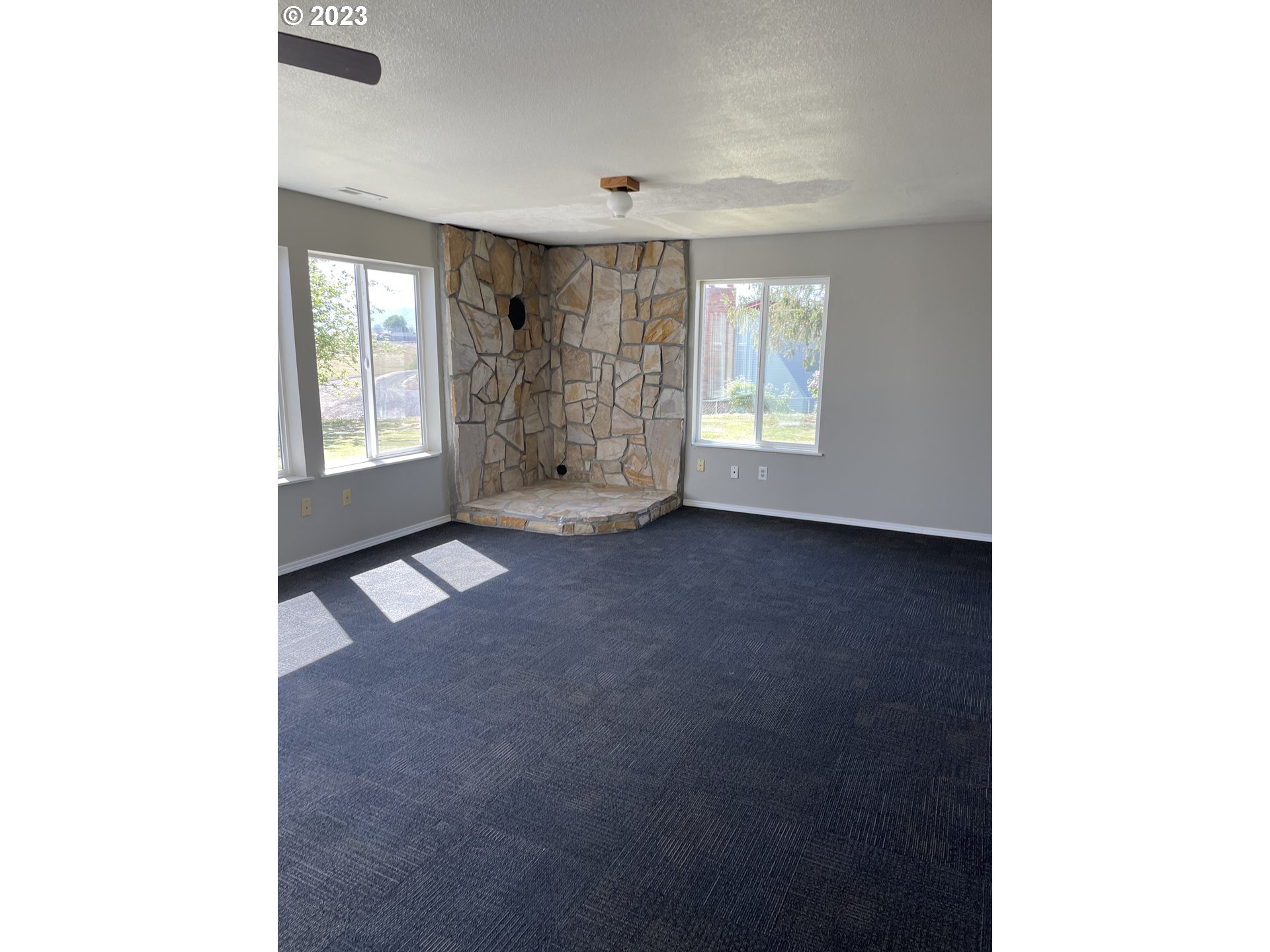 43776 Buckboard Trail Road Pendleton, OR 97801 - Photo 14 of 22 a view of an empty room with a window