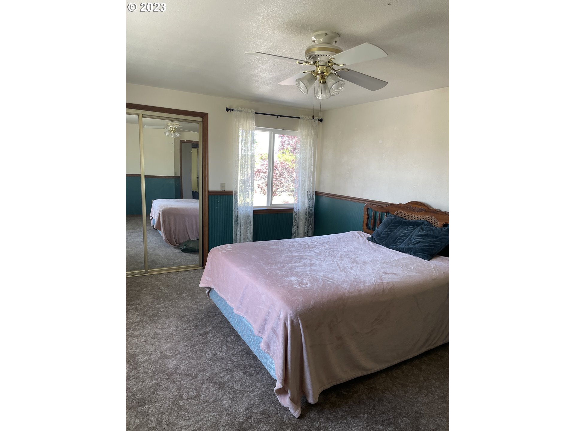 43776 Buckboard Trail Road Pendleton, OR 97801 - Photo 10 of 22 a bedroom with a bed and window