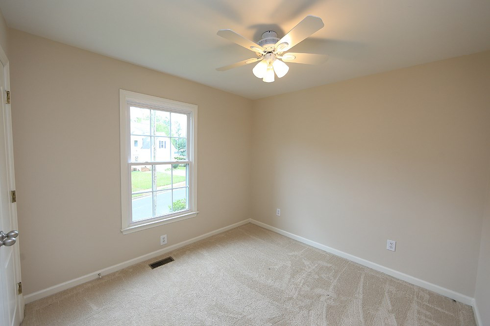 9712 Miranda Drive Raleigh, NC 27617 - Photo 17 of 25 Spacious secondary bedrooms on the 2nd floor. Bedroom 1