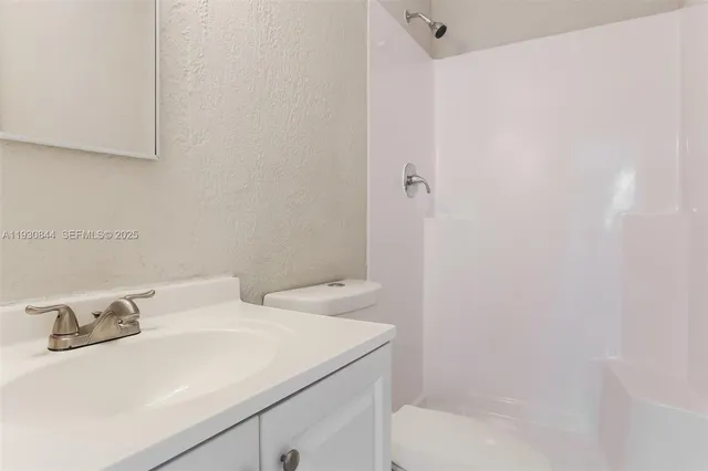 a bathroom with a sink and a bathtub
