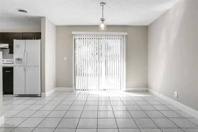 a view of an entryway with a window