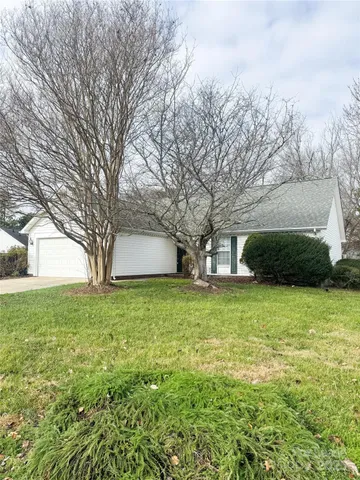 a fire hydrant in the middle of a field