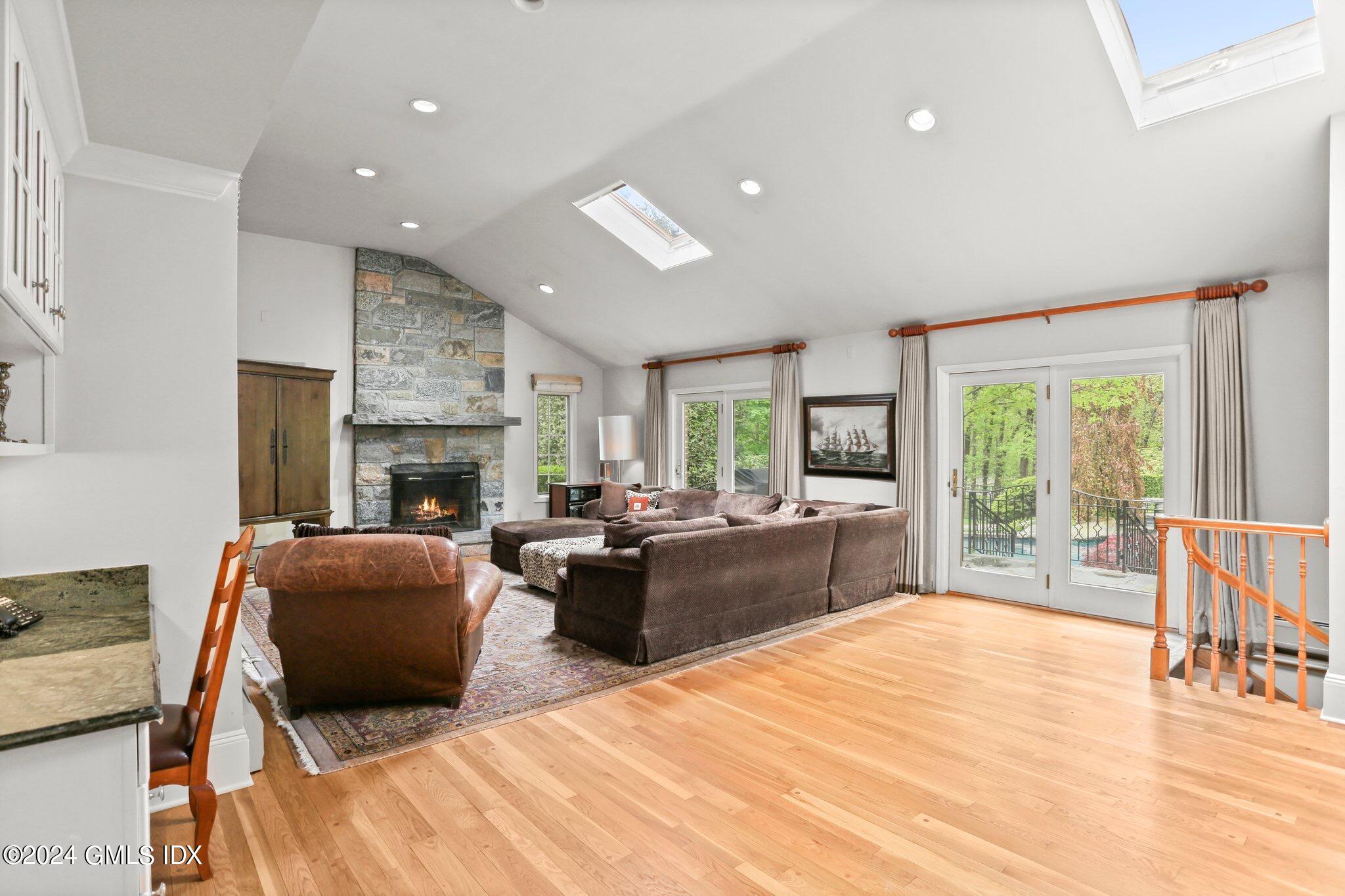 376 Westover Road Stamford, CT 06902 - Photo 14 of 37 a living room with fireplace furniture and a large window