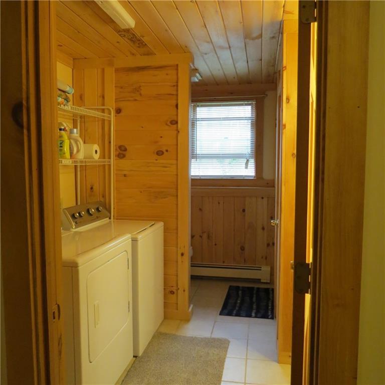 14 Conesca Road Raymond, ME 04071 - Photo 17 of 26 Bathroom in the basement / Laundry area