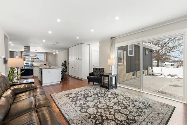 a living room with furniture and a table
