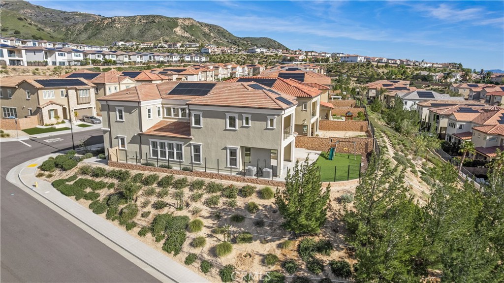 20638 Deer Grass Court Porter Ranch, CA 91326 - Photo 45 of 50 an aerial view of residential houses with city view