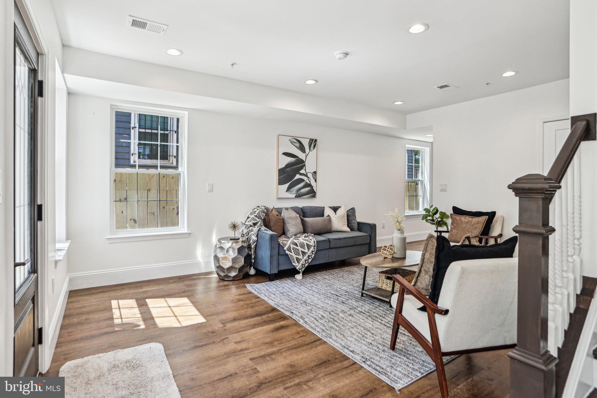 322 56th Street Northeast Washington, DC 20019 - Photo 11 of 57 a living room with furniture and a window