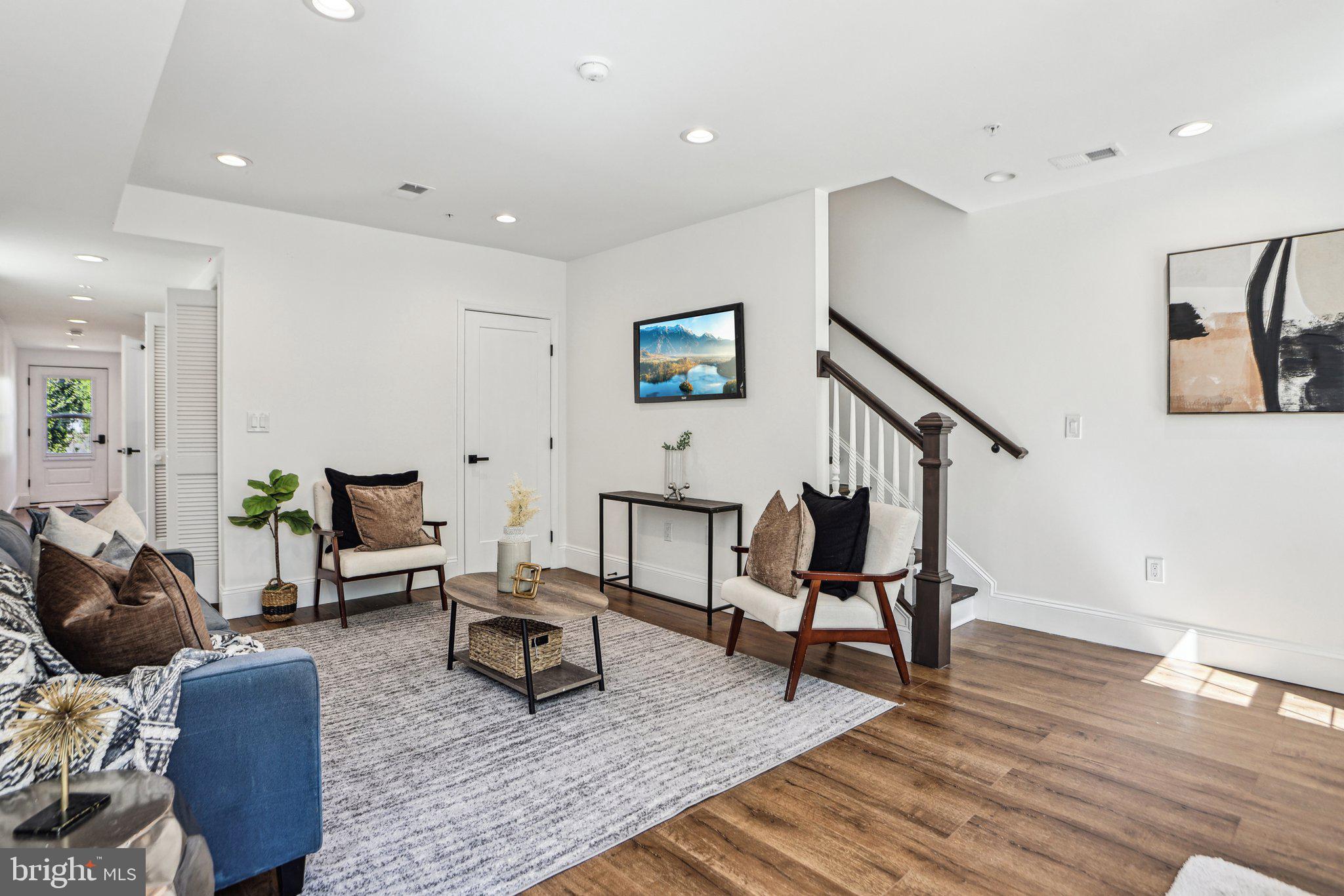 322 56th Street Northeast Washington, DC 20019 - Photo 12 of 57 a living room with furniture and wooden floor