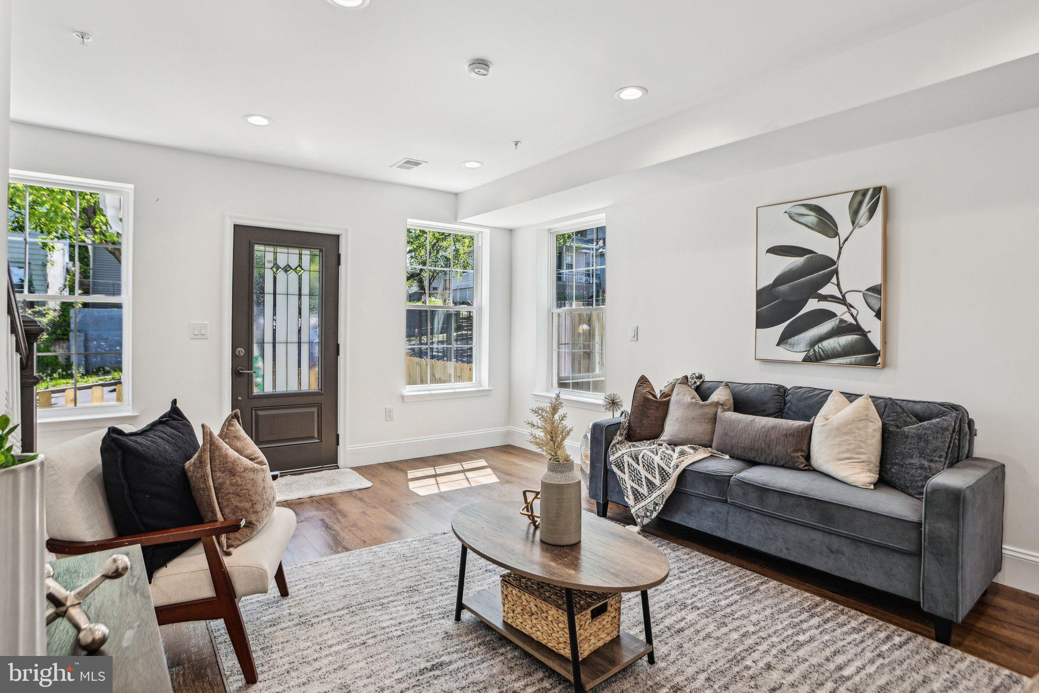 322 56th Street Northeast Washington, DC 20019 - Photo 14 of 57 a living room with furniture and a window