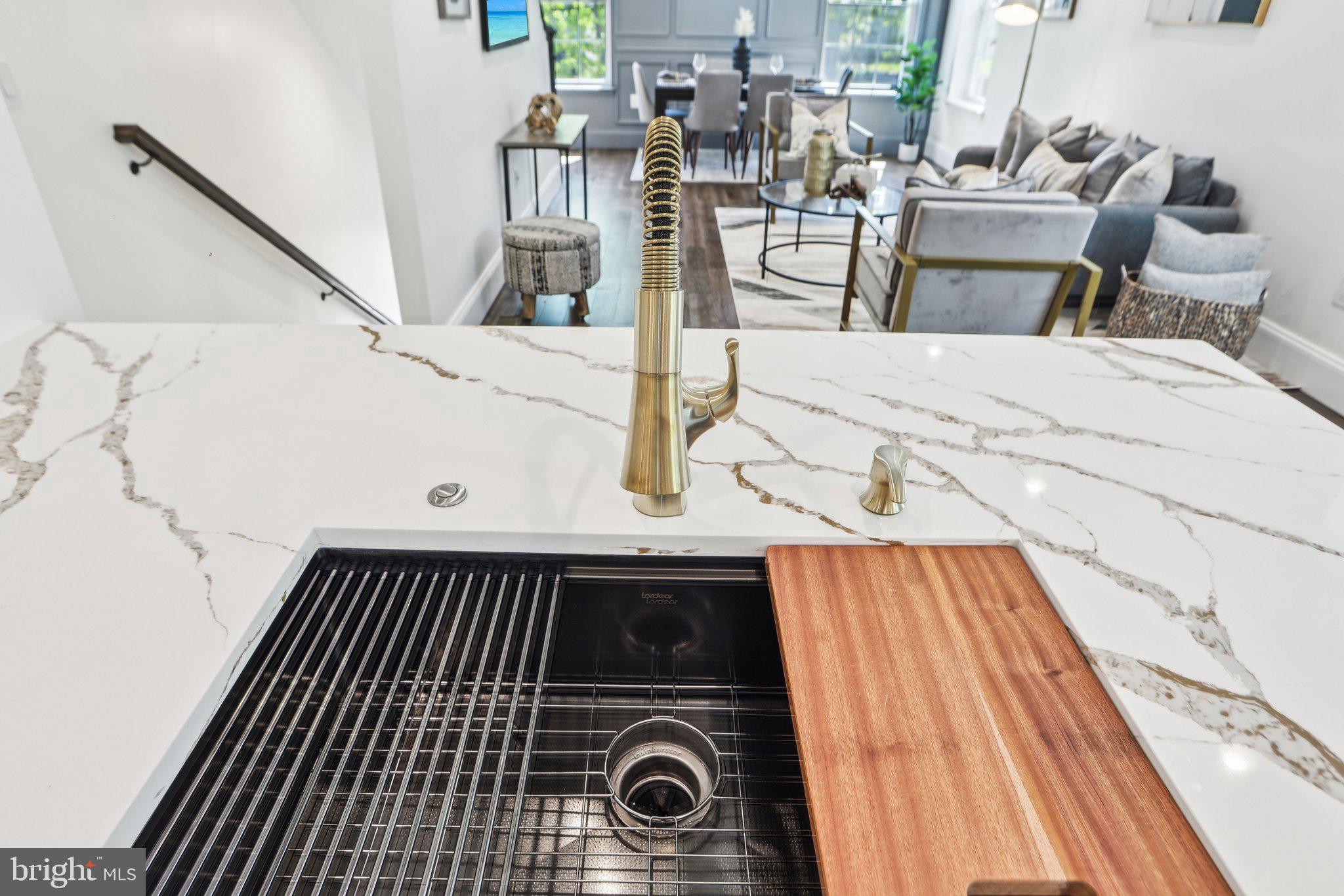 322 56th Street Northeast Washington, DC 20019 - Photo 20 of 57 a view of kitchen and dining room with wooden floor