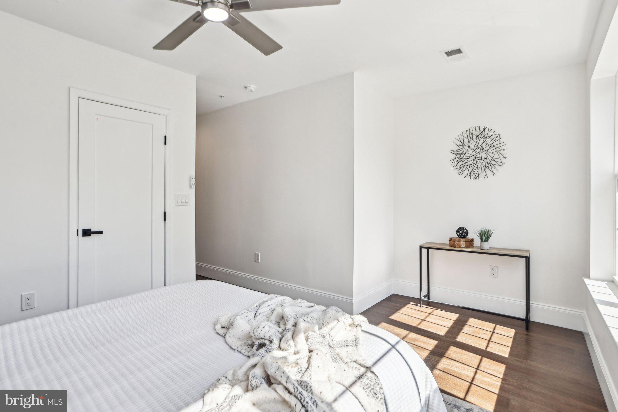 322 56th Street Northeast Washington, DC 20019 - Photo 27 of 57 a bedroom with a bed and a dresser