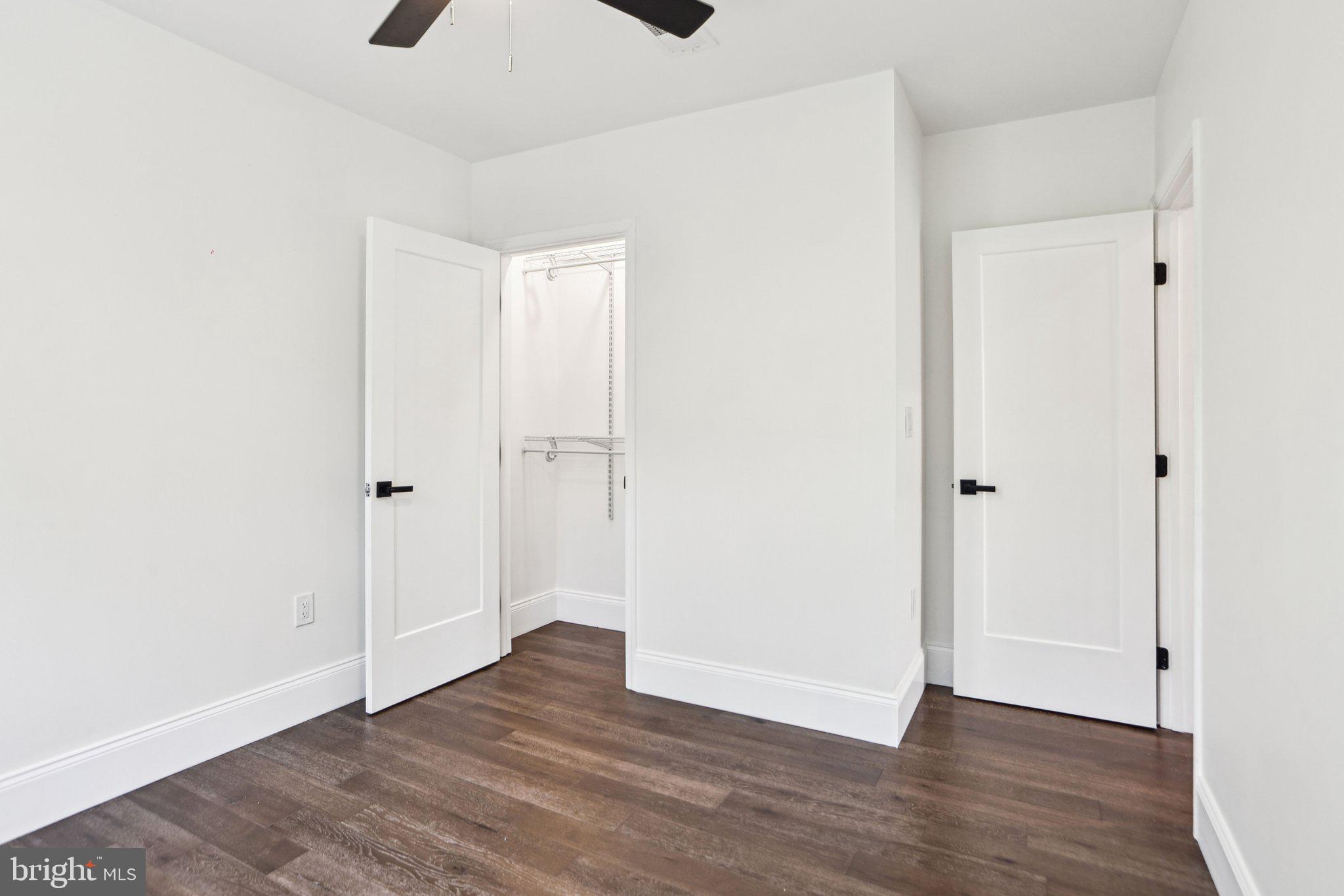 322 56th Street Northeast Washington, DC 20019 - Photo 32 of 57 a view of an empty room with wooden floor