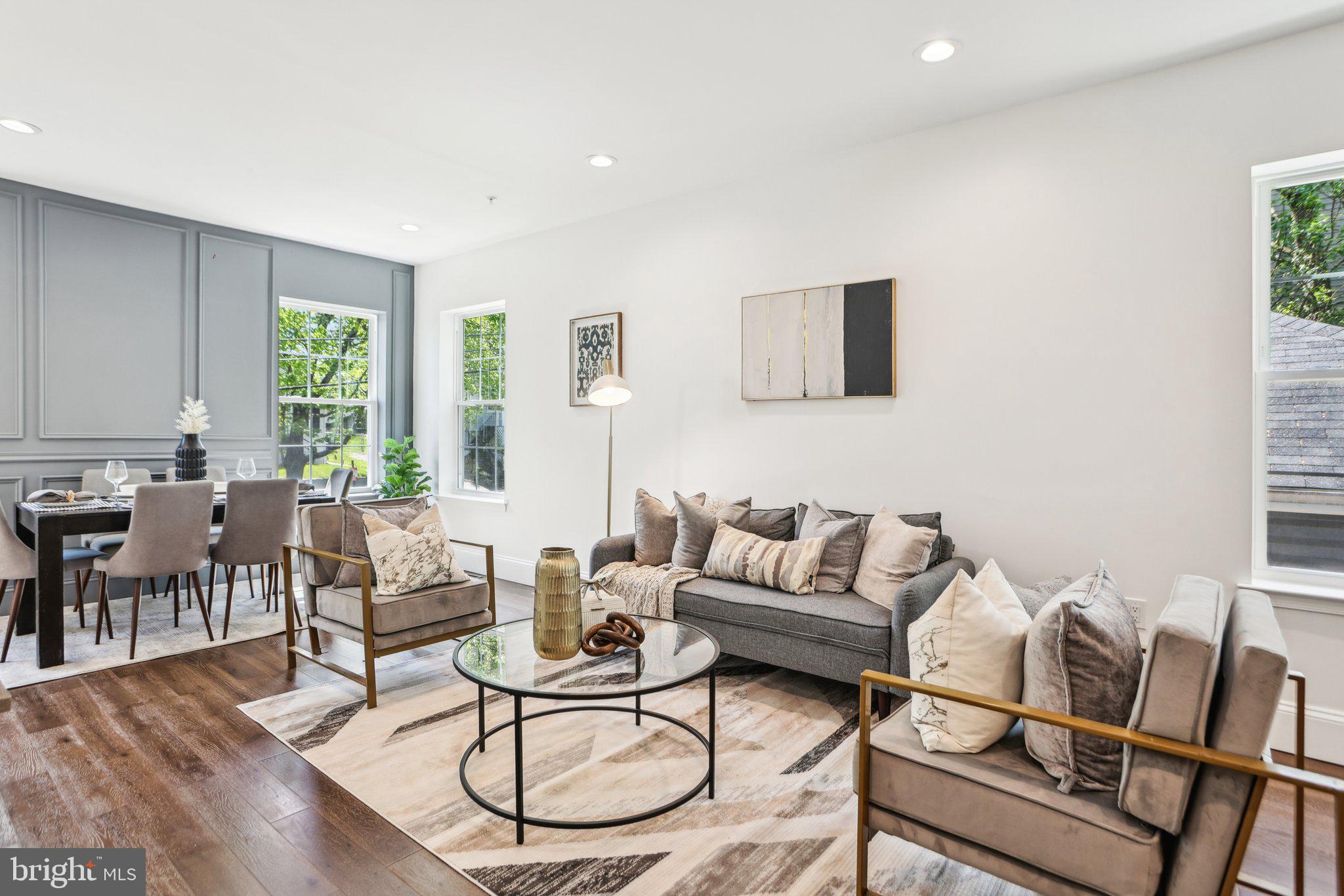 322 56th Street Northeast Washington, DC 20019 - Photo 8 of 57 a living room with furniture and a large window