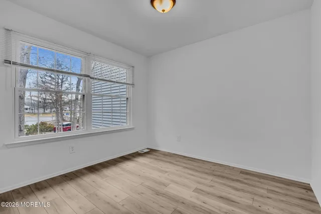 a view of a room that has a window