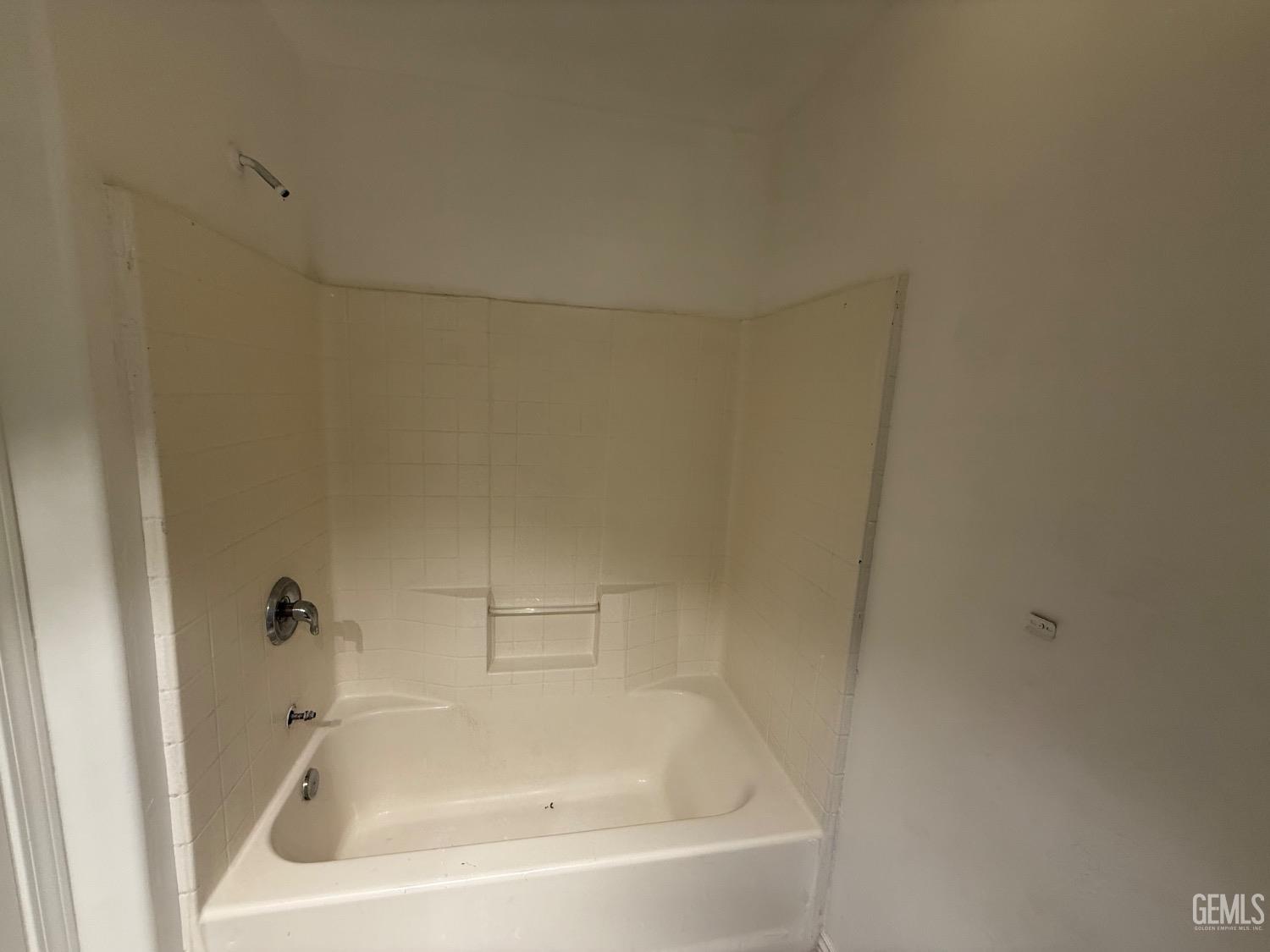 Undisclosed Address Bakersfield, CA 93313 - Photo 30 of 37 a white bath tub and shower