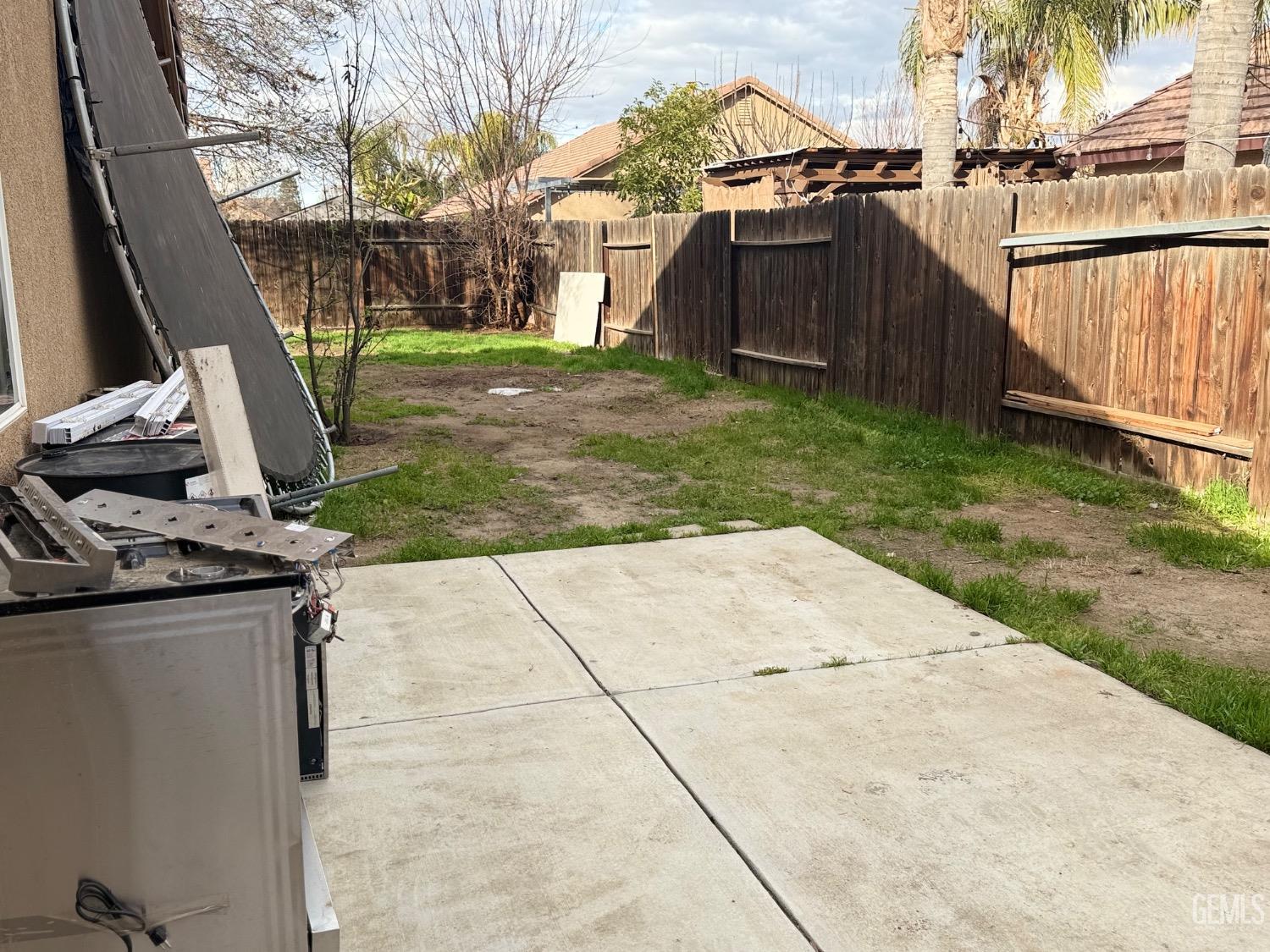 Undisclosed Address Bakersfield, CA 93313 - Photo 32 of 37 a view of backyard with wooden fence