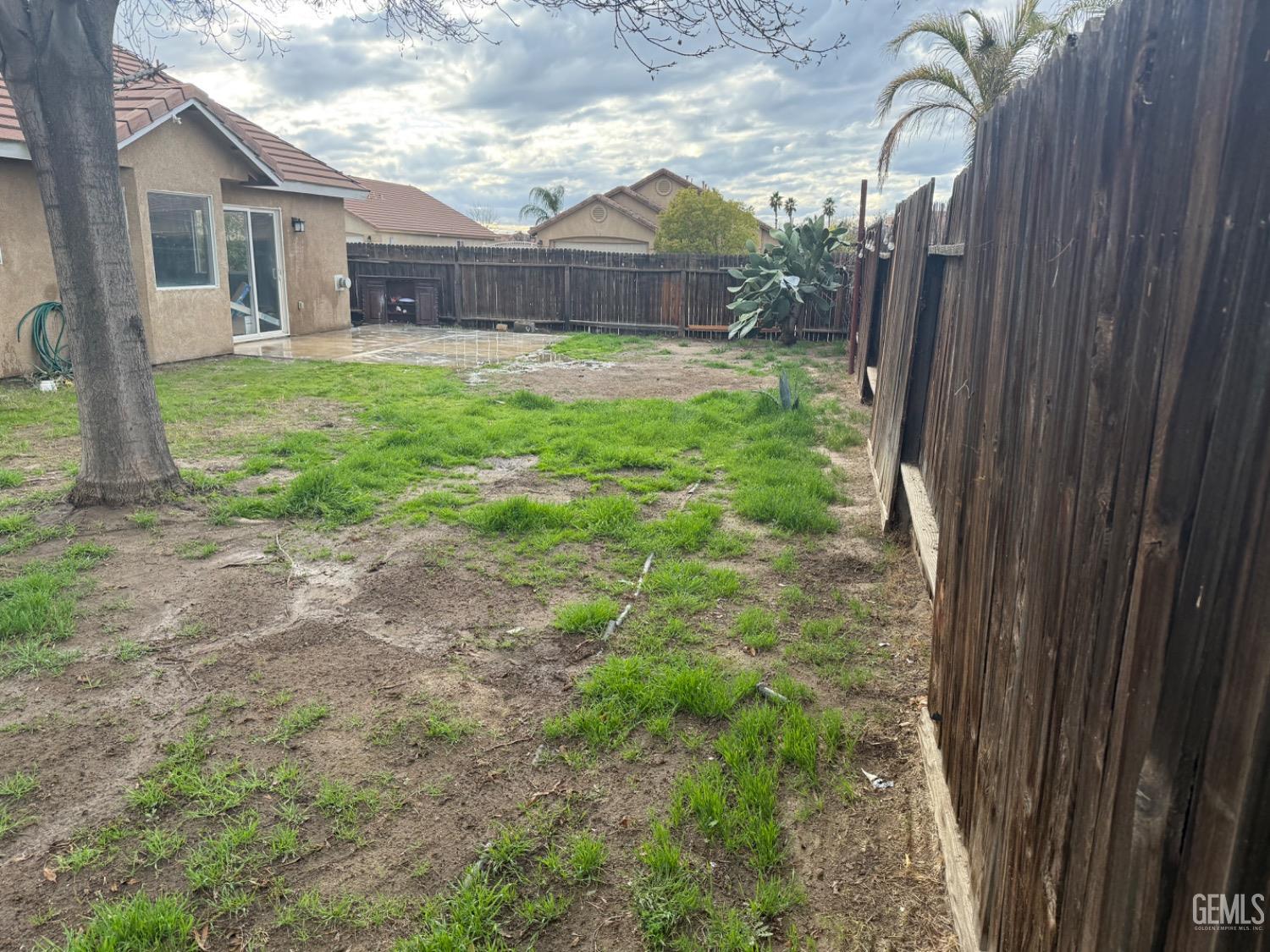 Undisclosed Address Bakersfield, CA 93313 - Photo 33 of 37 a backyard of a house with table and chairs