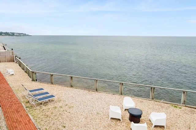 a view of a terrace with food on dining table